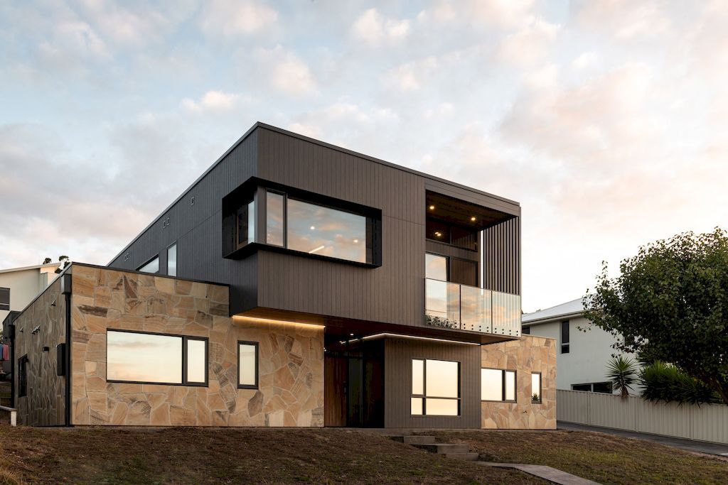 The char house inspired by fallen burnt tree branch by Starbox architecture