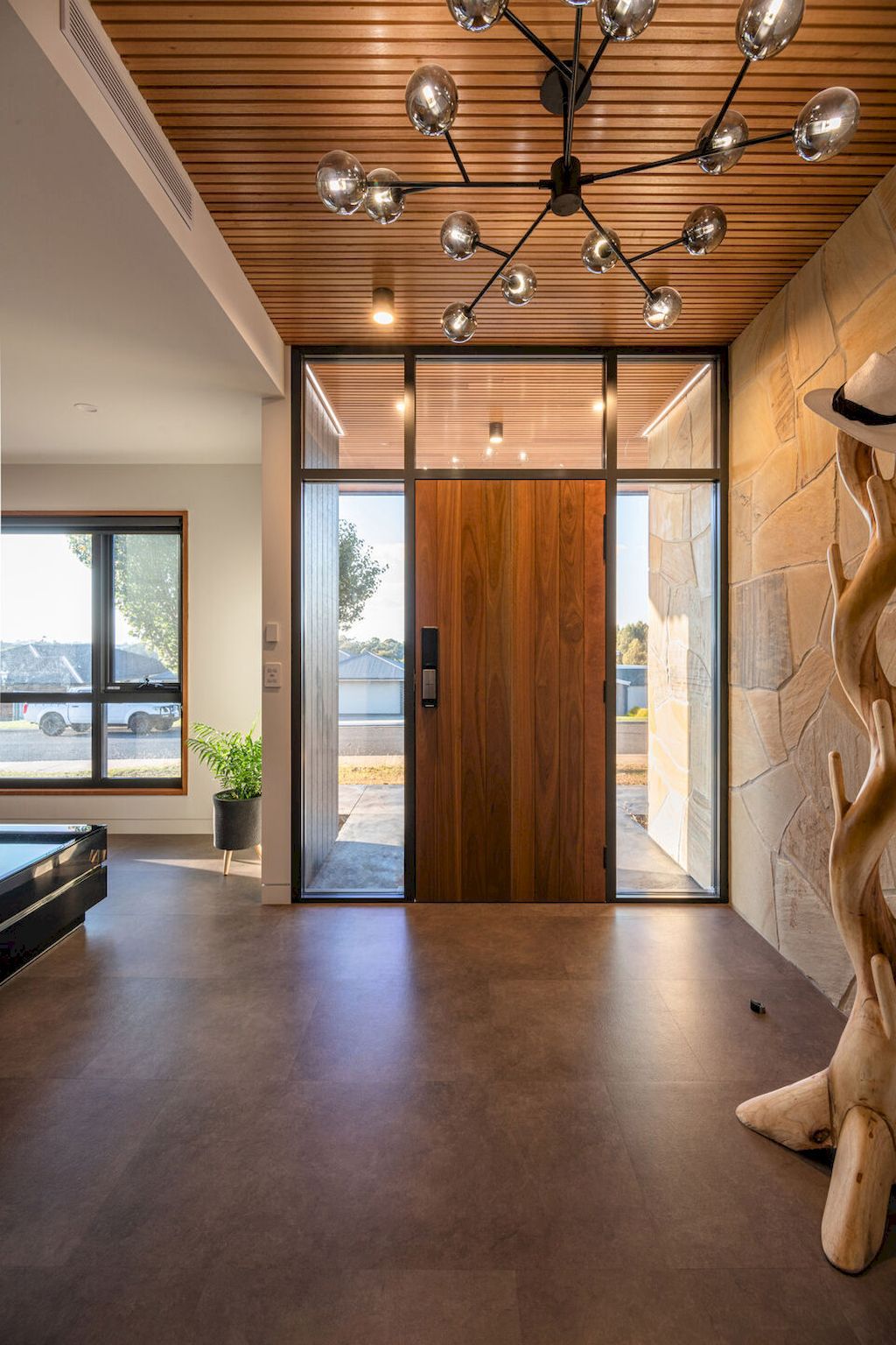 The char house inspired by fallen burnt tree branch by Starbox architecture