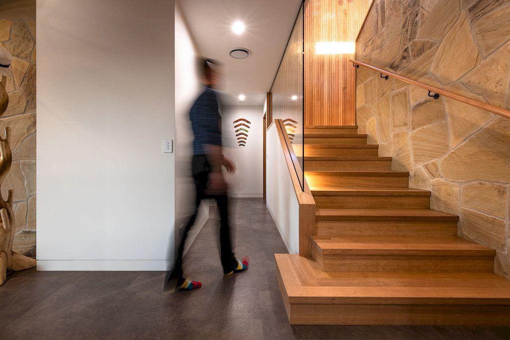 The char house inspired by fallen burnt tree branch by Starbox architecture