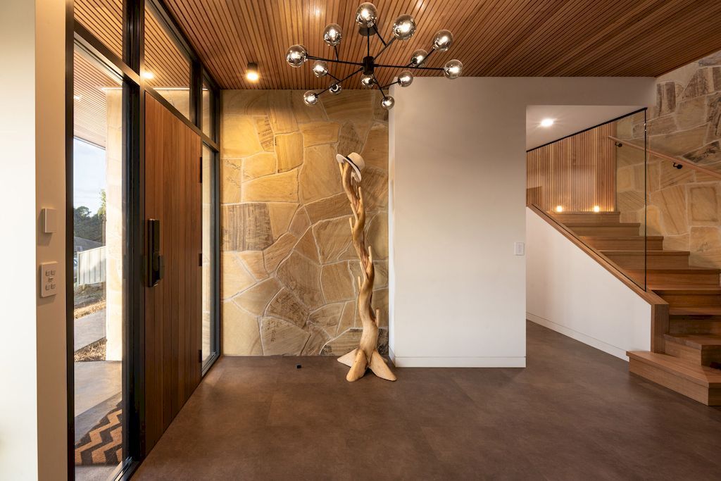 The char house inspired by fallen burnt tree branch by Starbox architecture