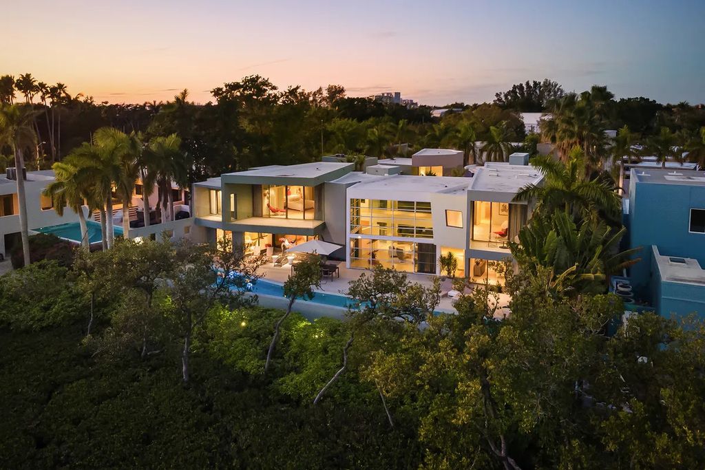 150 Morningside Drive, Sarasota, Florida is a stunning postmodern-style home was designed and built by the renowned architect Don Chapell showcasing the eclectic palette and materials of postmodernism, with an interplay of light and shadow that transforms each space.