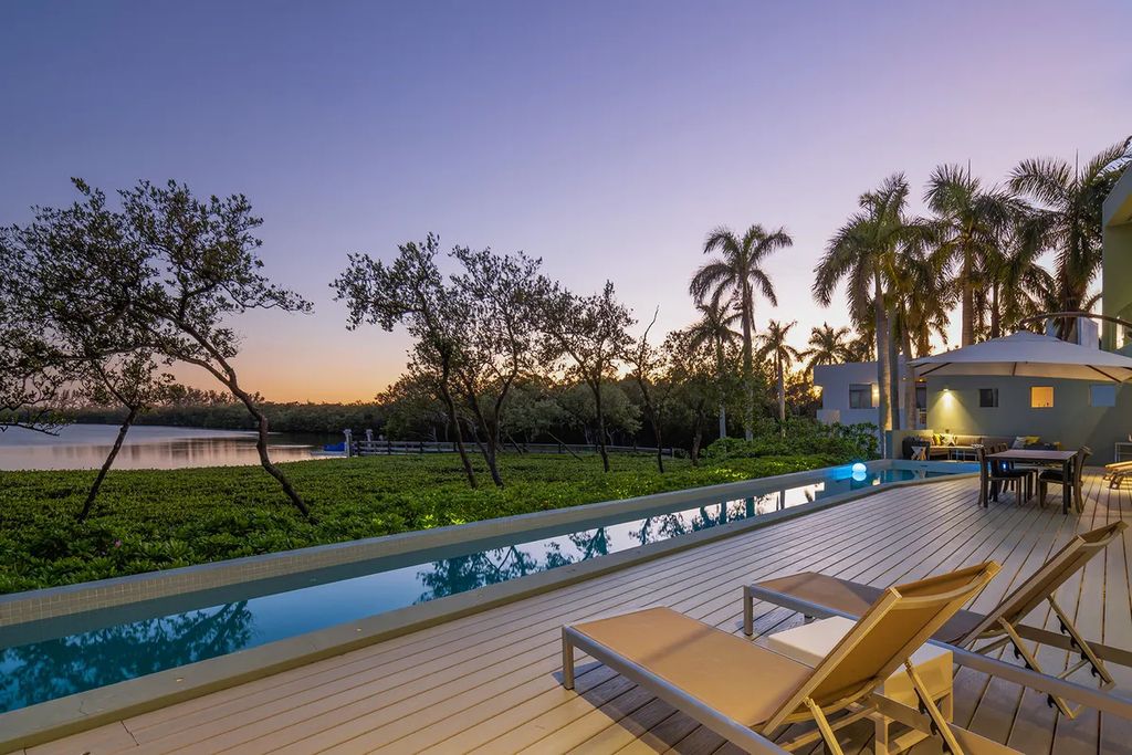 150 Morningside Drive, Sarasota, Florida is a stunning postmodern-style home was designed and built by the renowned architect Don Chapell showcasing the eclectic palette and materials of postmodernism, with an interplay of light and shadow that transforms each space.