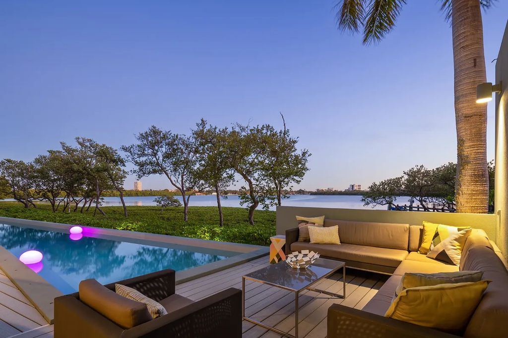 150 Morningside Drive, Sarasota, Florida is a stunning postmodern-style home was designed and built by the renowned architect Don Chapell showcasing the eclectic palette and materials of postmodernism, with an interplay of light and shadow that transforms each space.