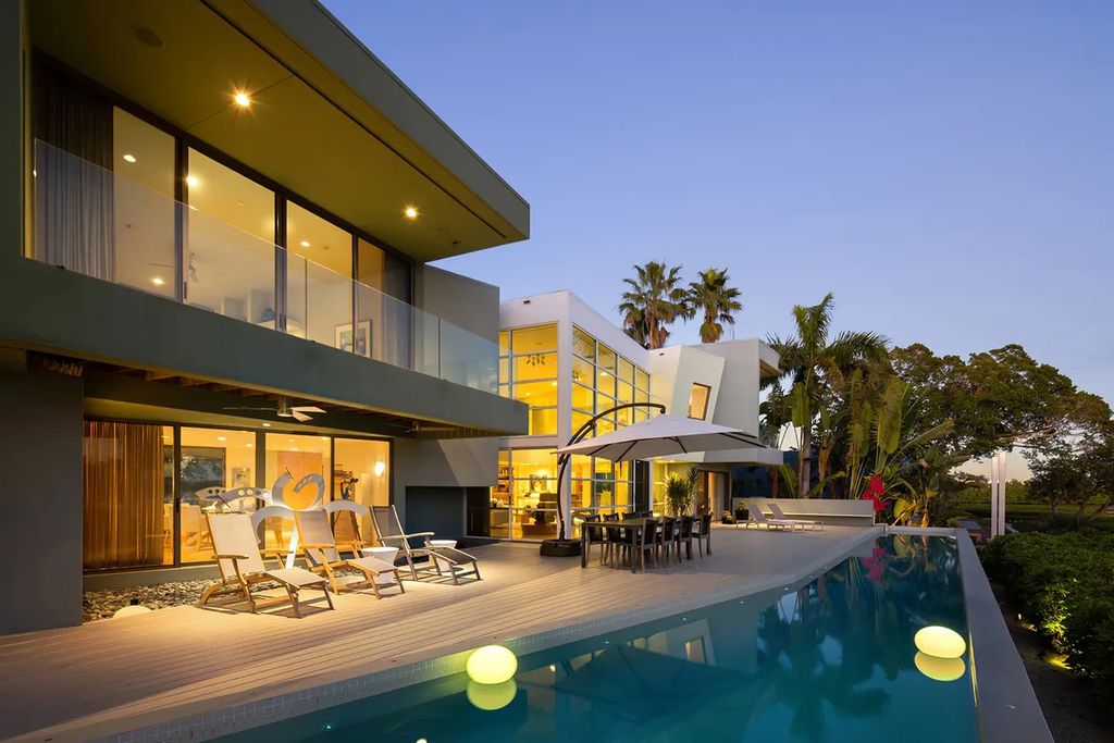 150 Morningside Drive, Sarasota, Florida is a stunning postmodern-style home was designed and built by the renowned architect Don Chapell showcasing the eclectic palette and materials of postmodernism, with an interplay of light and shadow that transforms each space.