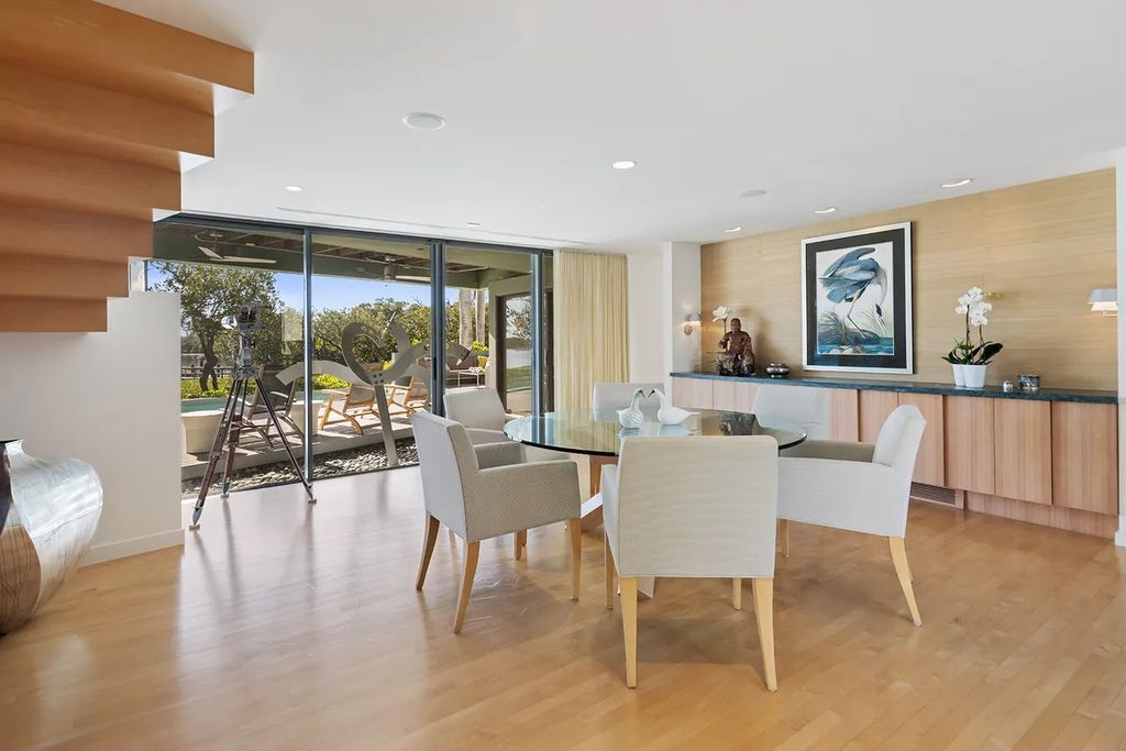 150 Morningside Drive, Sarasota, Florida is a stunning postmodern-style home was designed and built by the renowned architect Don Chapell showcasing the eclectic palette and materials of postmodernism, with an interplay of light and shadow that transforms each space.