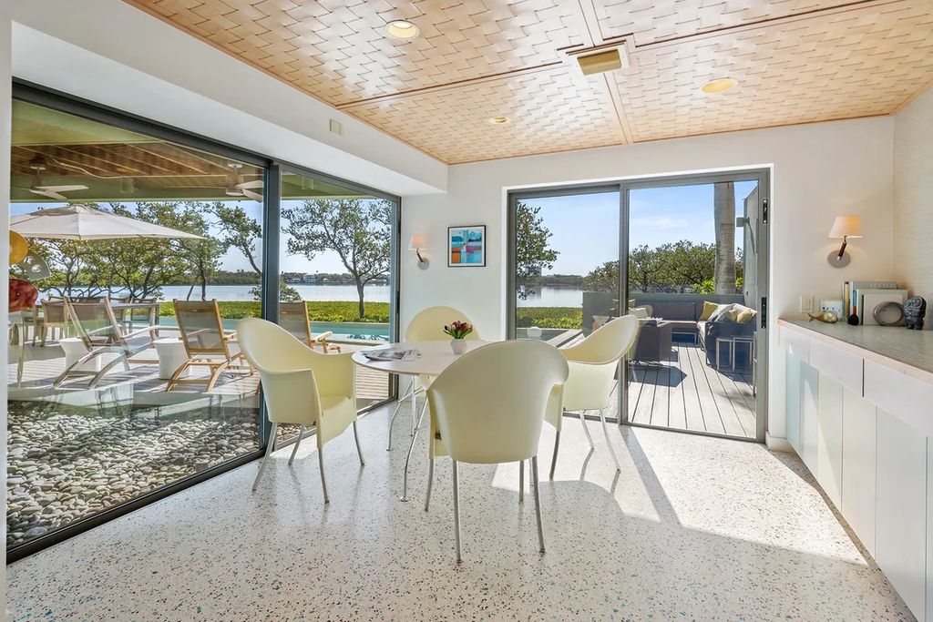 150 Morningside Drive, Sarasota, Florida is a stunning postmodern-style home was designed and built by the renowned architect Don Chapell showcasing the eclectic palette and materials of postmodernism, with an interplay of light and shadow that transforms each space.