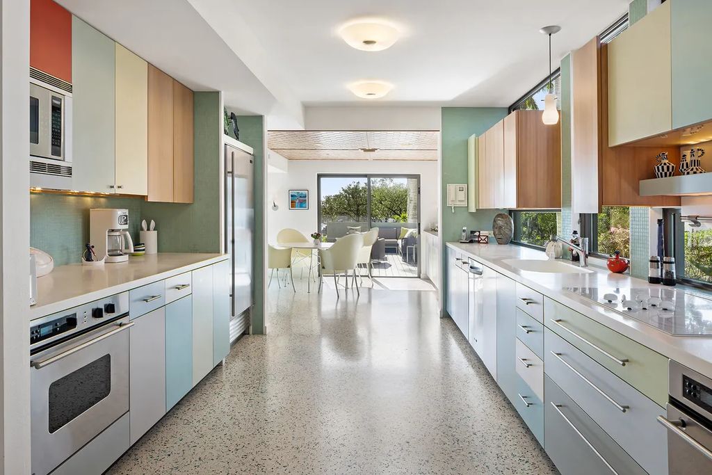 150 Morningside Drive, Sarasota, Florida is a stunning postmodern-style home was designed and built by the renowned architect Don Chapell showcasing the eclectic palette and materials of postmodernism, with an interplay of light and shadow that transforms each space.