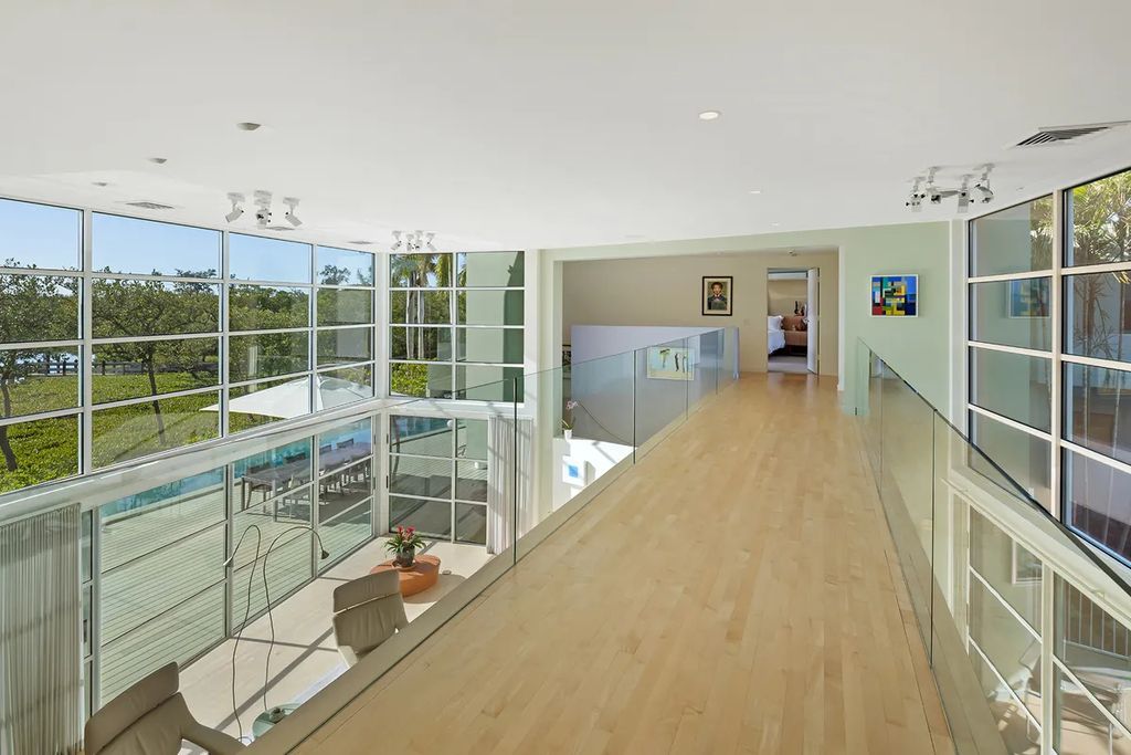 150 Morningside Drive, Sarasota, Florida is a stunning postmodern-style home was designed and built by the renowned architect Don Chapell showcasing the eclectic palette and materials of postmodernism, with an interplay of light and shadow that transforms each space.