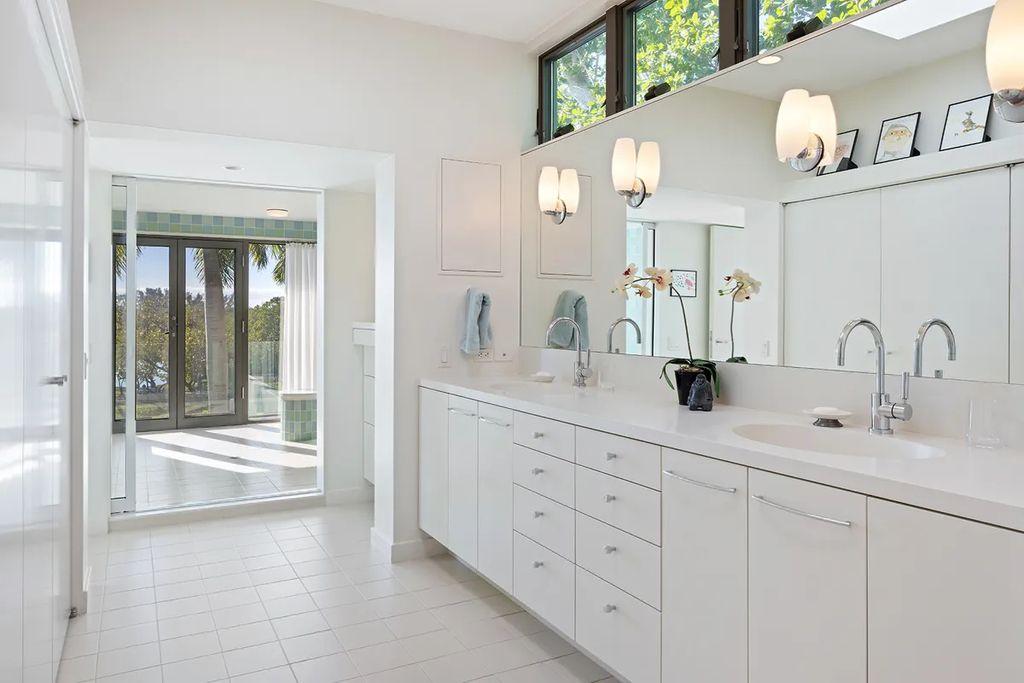 150 Morningside Drive, Sarasota, Florida is a stunning postmodern-style home was designed and built by the renowned architect Don Chapell showcasing the eclectic palette and materials of postmodernism, with an interplay of light and shadow that transforms each space.