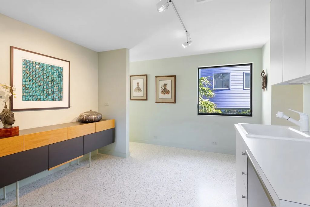 150 Morningside Drive, Sarasota, Florida is a stunning postmodern-style home was designed and built by the renowned architect Don Chapell showcasing the eclectic palette and materials of postmodernism, with an interplay of light and shadow that transforms each space.