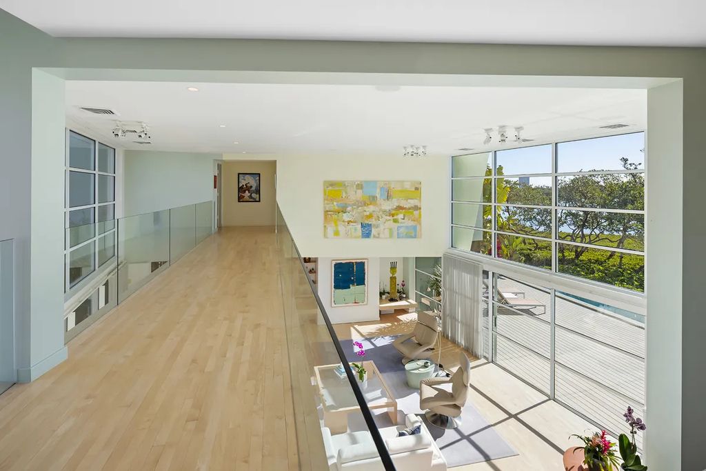 150 Morningside Drive, Sarasota, Florida is a stunning postmodern-style home was designed and built by the renowned architect Don Chapell showcasing the eclectic palette and materials of postmodernism, with an interplay of light and shadow that transforms each space.
