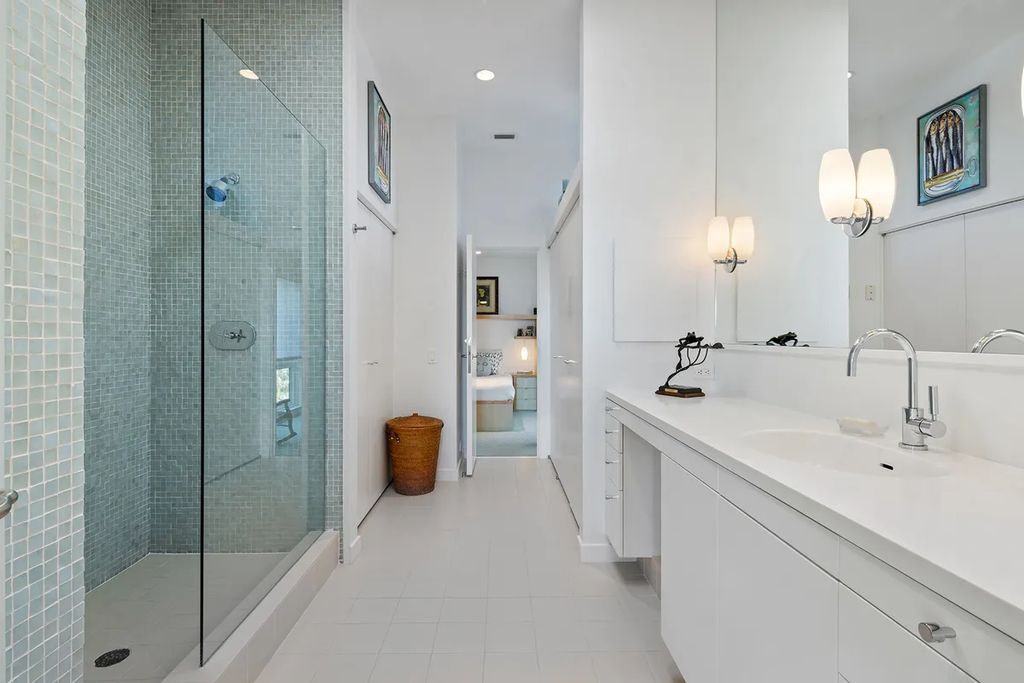 150 Morningside Drive, Sarasota, Florida is a stunning postmodern-style home was designed and built by the renowned architect Don Chapell showcasing the eclectic palette and materials of postmodernism, with an interplay of light and shadow that transforms each space.