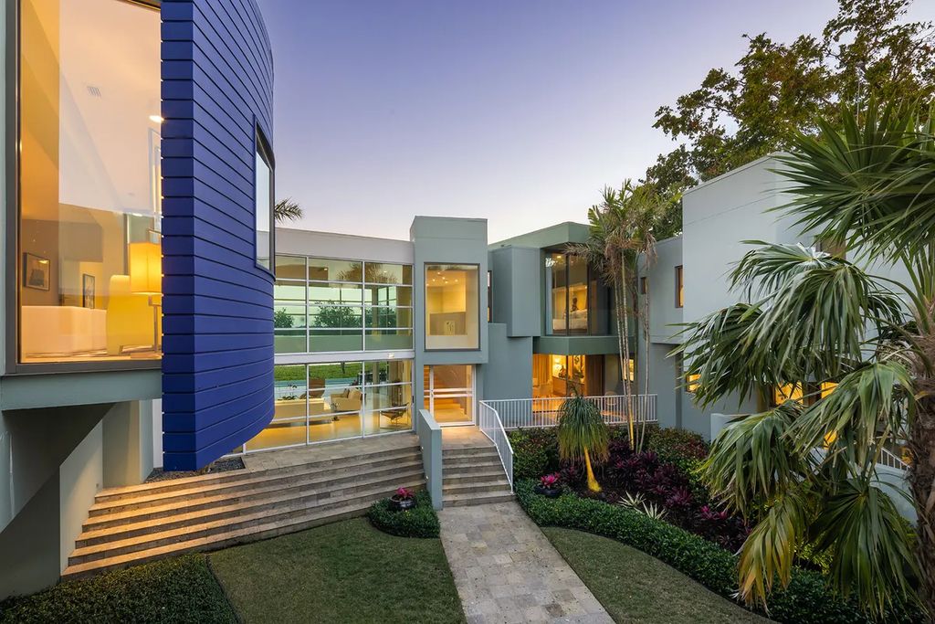 150 Morningside Drive, Sarasota, Florida is a stunning postmodern-style home was designed and built by the renowned architect Don Chapell showcasing the eclectic palette and materials of postmodernism, with an interplay of light and shadow that transforms each space.