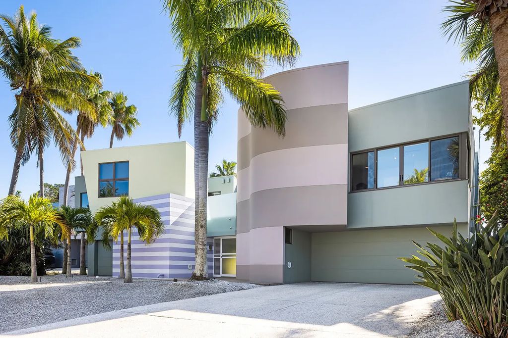 150 Morningside Drive, Sarasota, Florida is a stunning postmodern-style home was designed and built by the renowned architect Don Chapell showcasing the eclectic palette and materials of postmodernism, with an interplay of light and shadow that transforms each space.