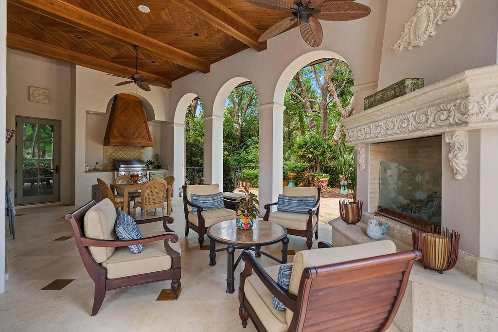 11736 Valeros Court, Palm Beach Gardens, Florida is a special residence in the exclusive Old Palm Golf Club with an amazing array of luxury amenities and design details, amenities include concrete block construction, impact windows and doors, brand new roof, whole home generator, elevator, 5 car garages.
