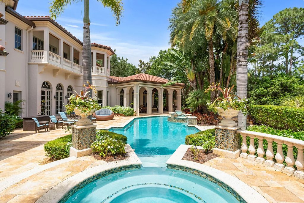 11736 Valeros Court, Palm Beach Gardens, Florida is a special residence in the exclusive Old Palm Golf Club with an amazing array of luxury amenities and design details, amenities include concrete block construction, impact windows and doors, brand new roof, whole home generator, elevator, 5 car garages.