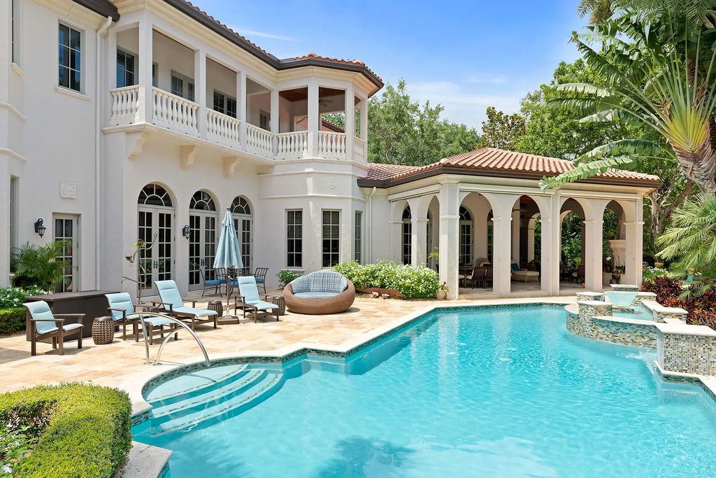11736 Valeros Court, Palm Beach Gardens, Florida is a special residence in the exclusive Old Palm Golf Club with an amazing array of luxury amenities and design details, amenities include concrete block construction, impact windows and doors, brand new roof, whole home generator, elevator, 5 car garages.