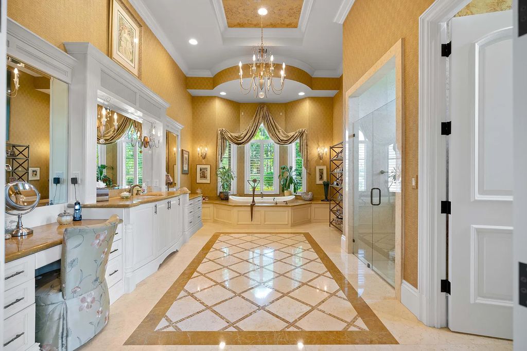 11736 Valeros Court, Palm Beach Gardens, Florida is a special residence in the exclusive Old Palm Golf Club with an amazing array of luxury amenities and design details, amenities include concrete block construction, impact windows and doors, brand new roof, whole home generator, elevator, 5 car garages.
