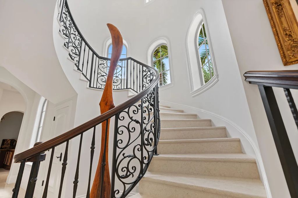 11736 Valeros Court, Palm Beach Gardens, Florida is a special residence in the exclusive Old Palm Golf Club with an amazing array of luxury amenities and design details, amenities include concrete block construction, impact windows and doors, brand new roof, whole home generator, elevator, 5 car garages.