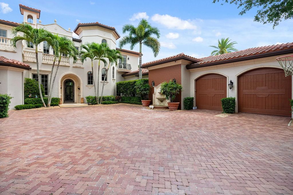 11736 Valeros Court, Palm Beach Gardens, Florida is a special residence in the exclusive Old Palm Golf Club with an amazing array of luxury amenities and design details, amenities include concrete block construction, impact windows and doors, brand new roof, whole home generator, elevator, 5 car garages.