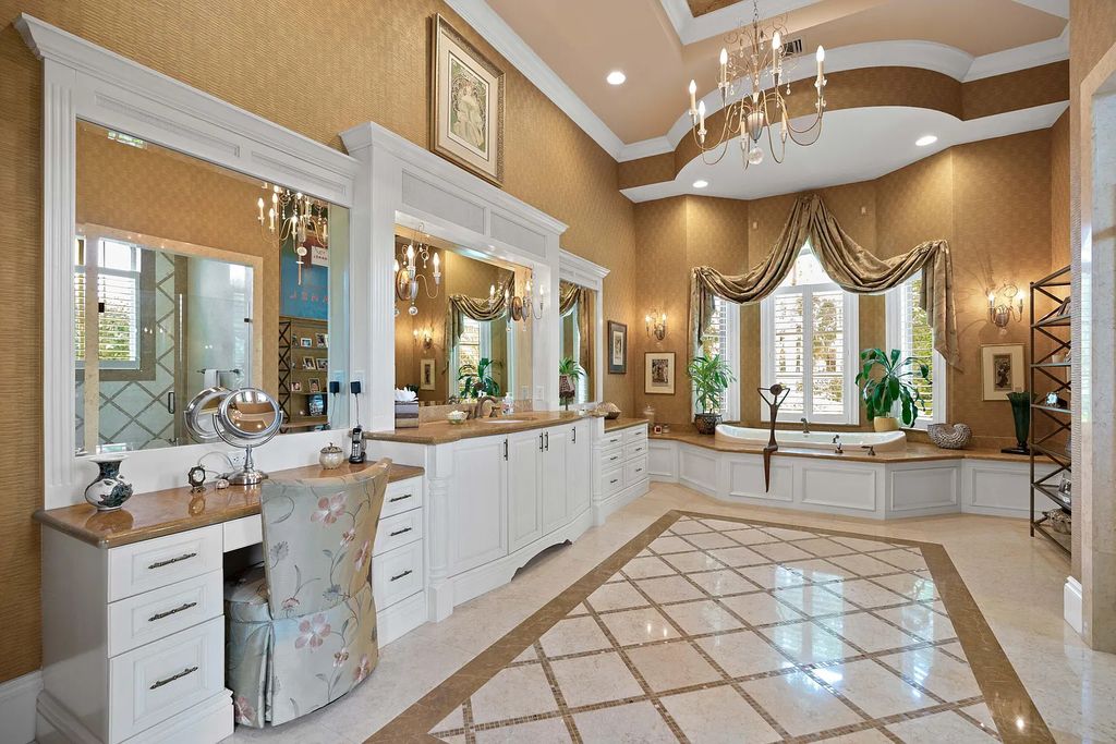11736 Valeros Court, Palm Beach Gardens, Florida is a special residence in the exclusive Old Palm Golf Club with an amazing array of luxury amenities and design details, amenities include concrete block construction, impact windows and doors, brand new roof, whole home generator, elevator, 5 car garages.