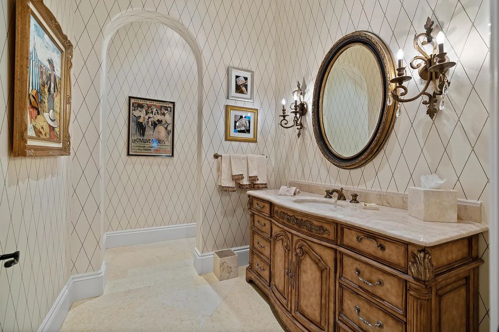 11736 Valeros Court, Palm Beach Gardens, Florida is a special residence in the exclusive Old Palm Golf Club with an amazing array of luxury amenities and design details, amenities include concrete block construction, impact windows and doors, brand new roof, whole home generator, elevator, 5 car garages.