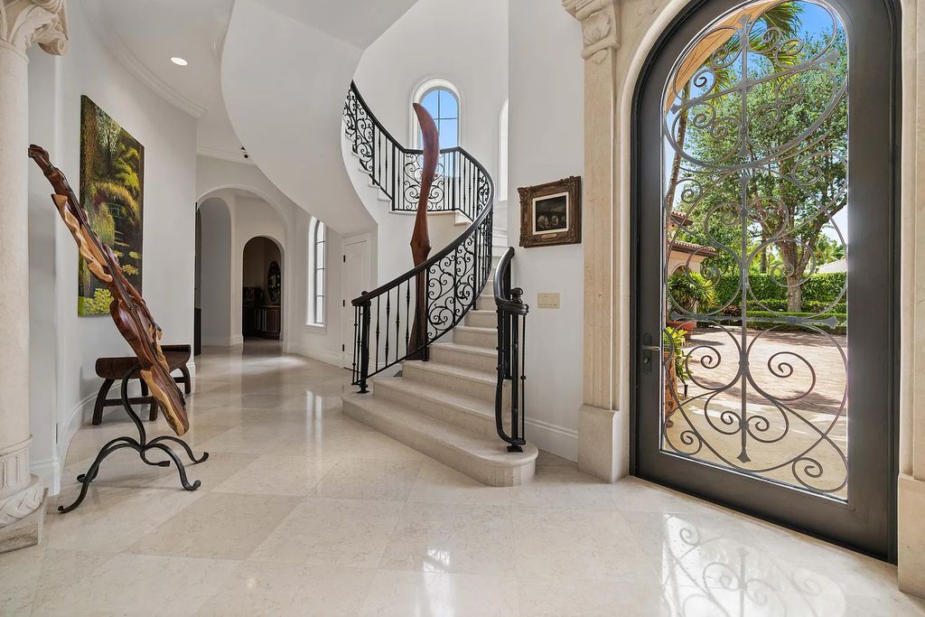 11736 Valeros Court, Palm Beach Gardens, Florida is a special residence in the exclusive Old Palm Golf Club with an amazing array of luxury amenities and design details, amenities include concrete block construction, impact windows and doors, brand new roof, whole home generator, elevator, 5 car garages.