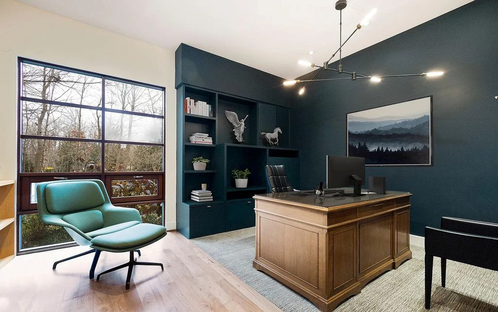 The House in Owings Mill features magnificent wooded views of the 2+ acre site plus 33 or more acres of open space in the valley beyond, now available for sale. This home located at 1 Huntersworth Ct, Owings Mills, Maryland
