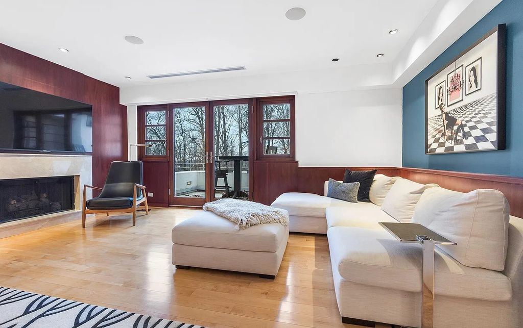 The House in Owings Mill features magnificent wooded views of the 2+ acre site plus 33 or more acres of open space in the valley beyond, now available for sale. This home located at 1 Huntersworth Ct, Owings Mills, Maryland