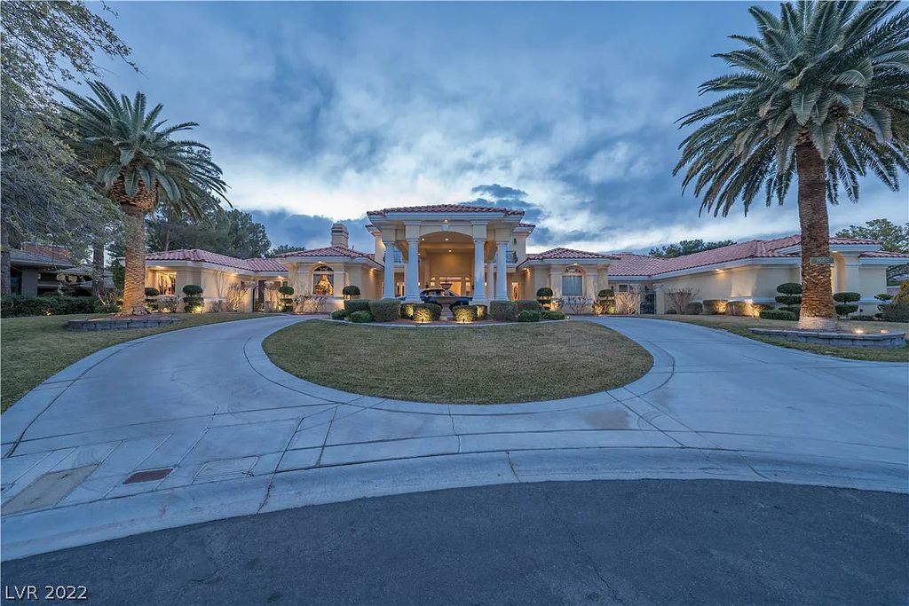 7600 Silver Meadow Court, Las Vegas, Nevada is a resort style estate in an exclusive gated enclave with a generous circular drive, a spacious living room punctuated by a stunning wrought iron floating staircase, a gourmet kitchen, venetian gardens, resort guest house and more.