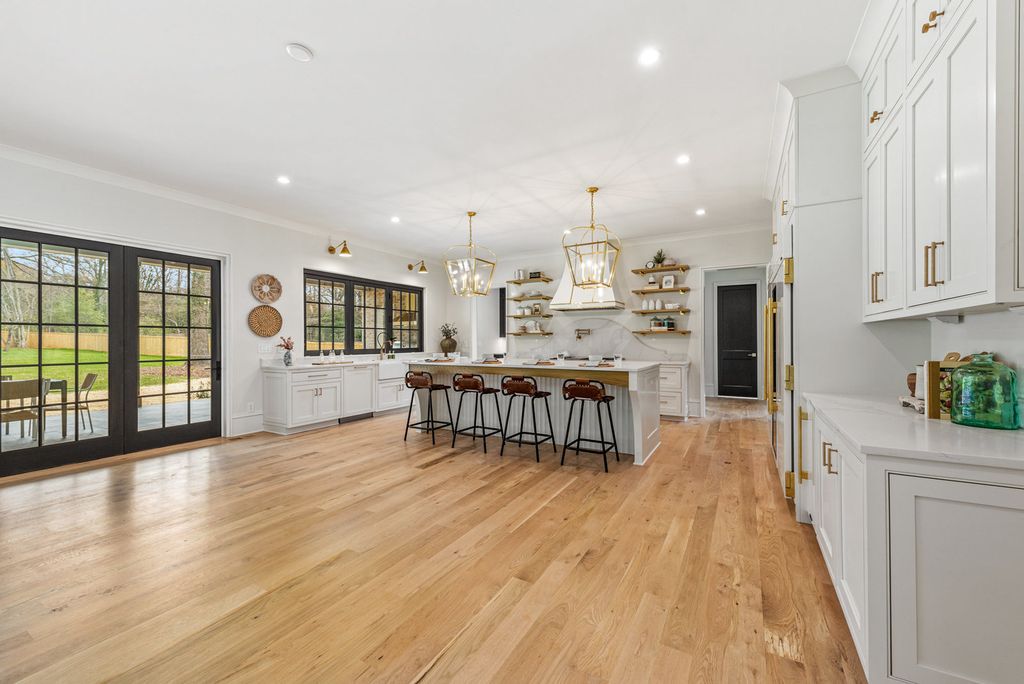 The Estate in Charlotte is a luxurious home showcasing stunning living spaces and amenities now available for sale. This home located at 6015 Lansing Dr, Charlotte, North Carolina; offering 05 bedrooms and 05 bathrooms with 5,712 square feet of living spaces.