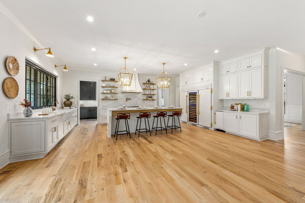 The Estate in Charlotte is a luxurious home showcasing stunning living spaces and amenities now available for sale. This home located at 6015 Lansing Dr, Charlotte, North Carolina; offering 05 bedrooms and 05 bathrooms with 5,712 square feet of living spaces.