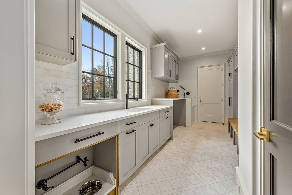 The Estate in Charlotte is a luxurious home showcasing stunning living spaces and amenities now available for sale. This home located at 6015 Lansing Dr, Charlotte, North Carolina; offering 05 bedrooms and 05 bathrooms with 5,712 square feet of living spaces.