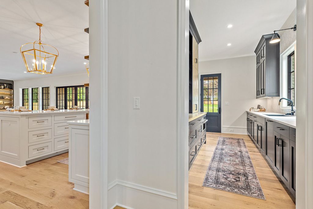 The Estate in Charlotte is a luxurious home showcasing stunning living spaces and amenities now available for sale. This home located at 6015 Lansing Dr, Charlotte, North Carolina; offering 05 bedrooms and 05 bathrooms with 5,712 square feet of living spaces.