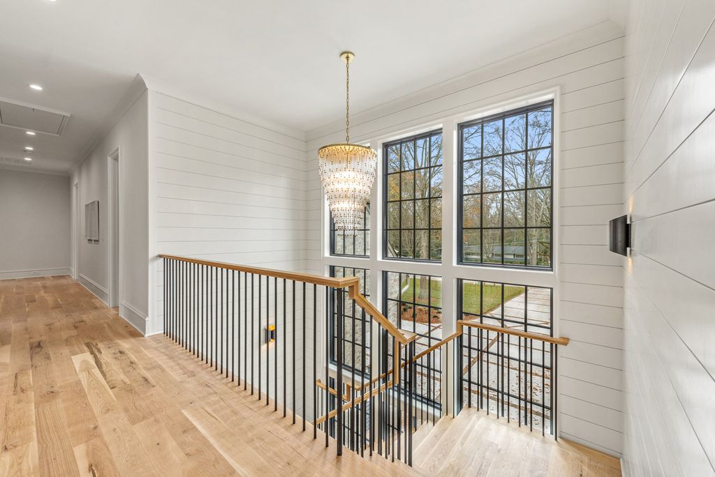 The Estate in Charlotte is a luxurious home showcasing stunning living spaces and amenities now available for sale. This home located at 6015 Lansing Dr, Charlotte, North Carolina; offering 05 bedrooms and 05 bathrooms with 5,712 square feet of living spaces.