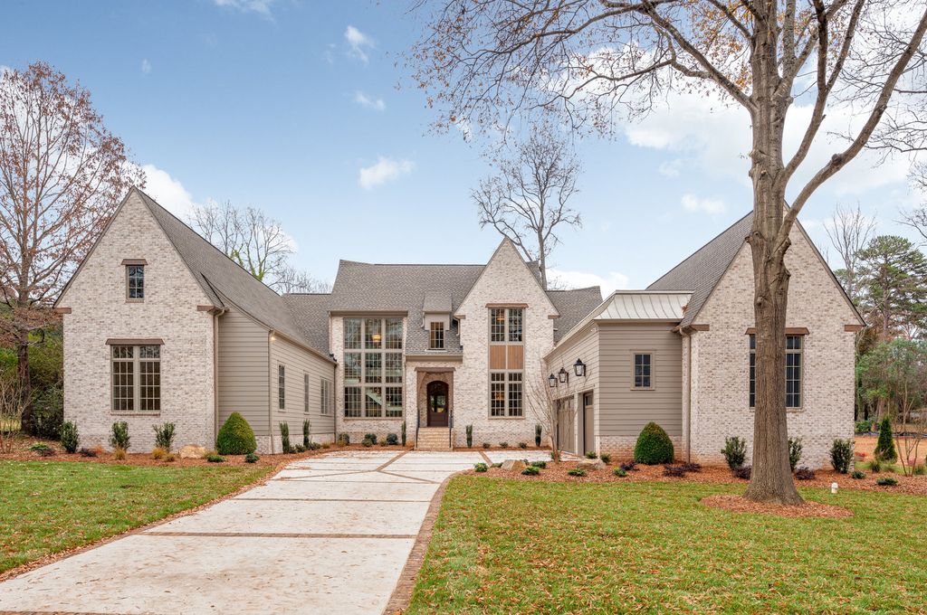 The Estate in Charlotte is a luxurious home showcasing stunning living spaces and amenities now available for sale. This home located at 6015 Lansing Dr, Charlotte, North Carolina; offering 05 bedrooms and 05 bathrooms with 5,712 square feet of living spaces.