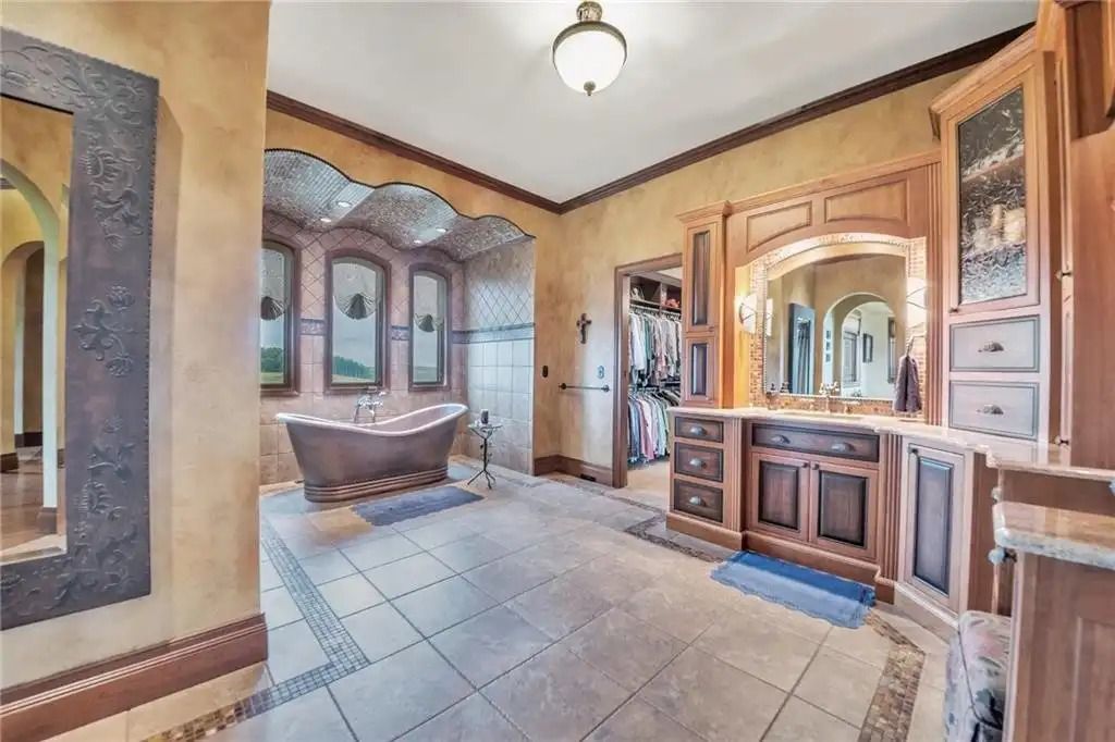 The Estate in Punxsutawney is a luxurious home that greets you by its unique architecture and design at every turn now available for sale. This home located at 34 Chapman Rd, Punxsutawney, Pennsylvania; offering 03 bedrooms and 08 bathrooms with 11,000 square feet of living spaces. 