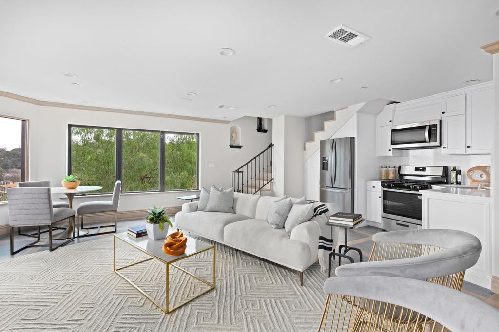 16479 Royal Hills Drive, Encino, California is a true private compound features a stunning main house, luxurious detached guest house, expansive resort type backyard and a unique art inspired swimmers infinity pool and spa that forge an effortless connection with jaw-dropping views.