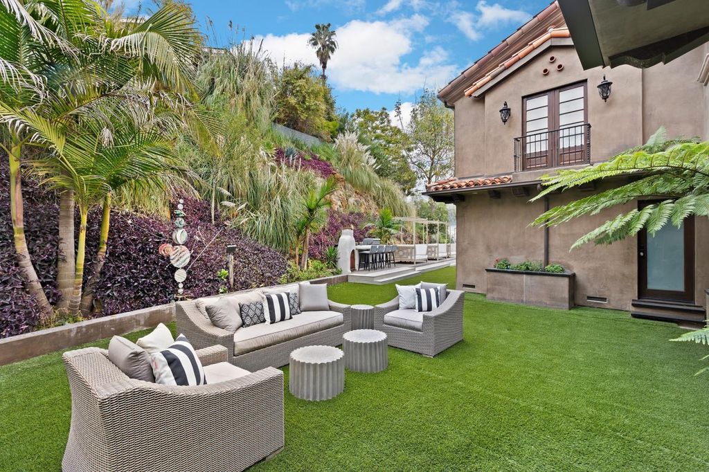16479 Royal Hills Drive, Encino, California is a true private compound features a stunning main house, luxurious detached guest house, expansive resort type backyard and a unique art inspired swimmers infinity pool and spa that forge an effortless connection with jaw-dropping views.