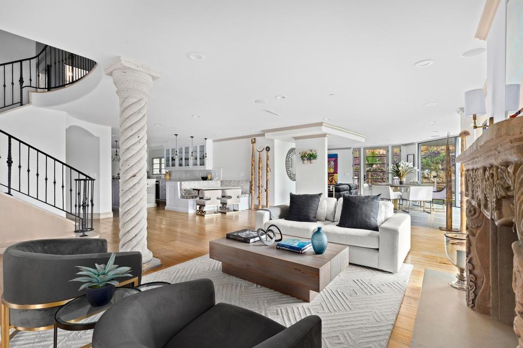 16479 Royal Hills Drive, Encino, California is a true private compound features a stunning main house, luxurious detached guest house, expansive resort type backyard and a unique art inspired swimmers infinity pool and spa that forge an effortless connection with jaw-dropping views.