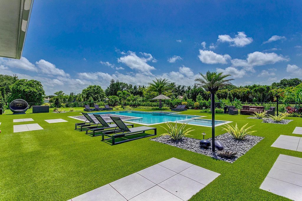 5812 Lady Luck Road, Palm Beach Gardens, Florida, is the finest modern new construction that is available in Steeplechase, one of the most desirable neighborhoods. This wonderful home in South Florida features the crispest modern interior and modern technology, such as the solar roof and Icynene foam insulation.