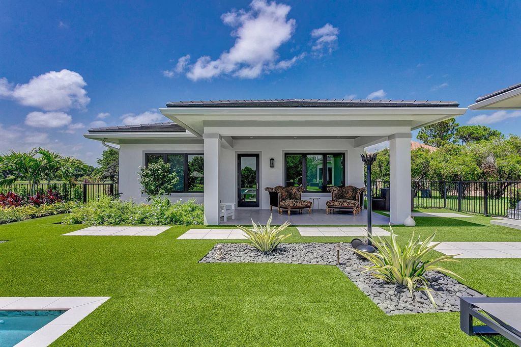 5812 Lady Luck Road, Palm Beach Gardens, Florida, is the finest modern new construction that is available in Steeplechase, one of the most desirable neighborhoods. This wonderful home in South Florida features the crispest modern interior and modern technology, such as the solar roof and Icynene foam insulation.