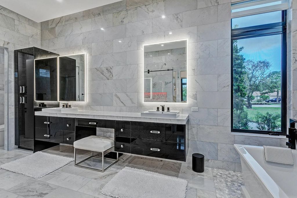 5812 Lady Luck Road, Palm Beach Gardens, Florida, is the finest modern new construction that is available in Steeplechase, one of the most desirable neighborhoods. This wonderful home in South Florida features the crispest modern interior and modern technology, such as the solar roof and Icynene foam insulation.