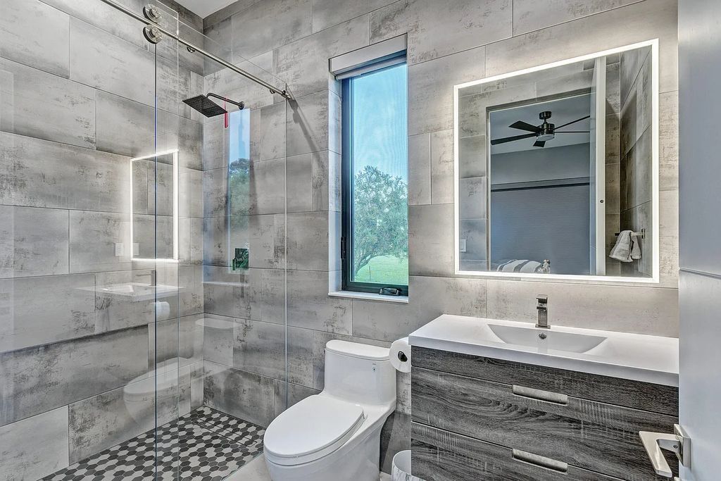 5812 Lady Luck Road, Palm Beach Gardens, Florida, is the finest modern new construction that is available in Steeplechase, one of the most desirable neighborhoods. This wonderful home in South Florida features the crispest modern interior and modern technology, such as the solar roof and Icynene foam insulation.