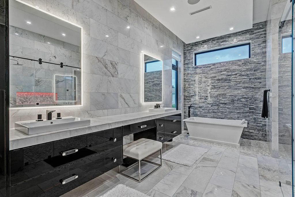5812 Lady Luck Road, Palm Beach Gardens, Florida, is the finest modern new construction that is available in Steeplechase, one of the most desirable neighborhoods. This wonderful home in South Florida features the crispest modern interior and modern technology, such as the solar roof and Icynene foam insulation.