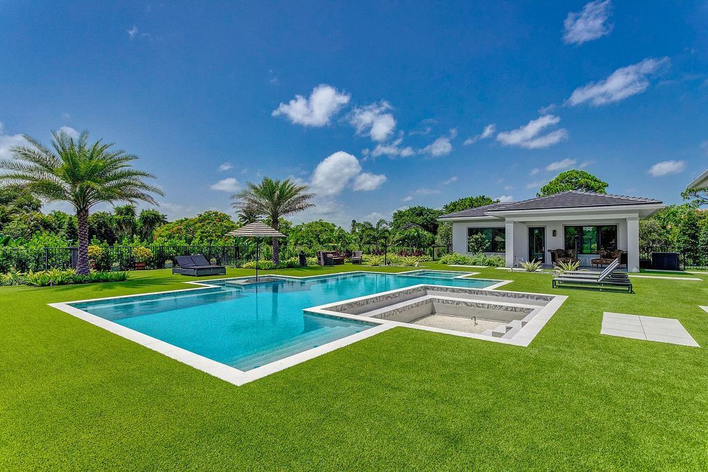 5812 Lady Luck Road, Palm Beach Gardens, Florida, is the finest modern new construction that is available in Steeplechase, one of the most desirable neighborhoods. This wonderful home in South Florida features the crispest modern interior and modern technology, such as the solar roof and Icynene foam insulation.