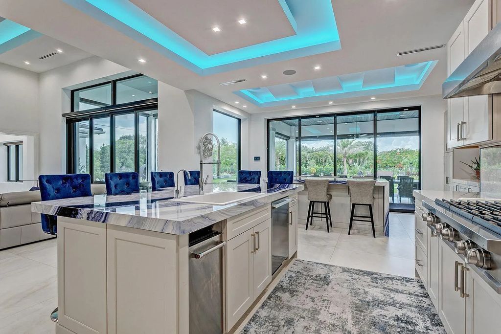5812 Lady Luck Road, Palm Beach Gardens, Florida, is the finest modern new construction that is available in Steeplechase, one of the most desirable neighborhoods. This wonderful home in South Florida features the crispest modern interior and modern technology, such as the solar roof and Icynene foam insulation.
