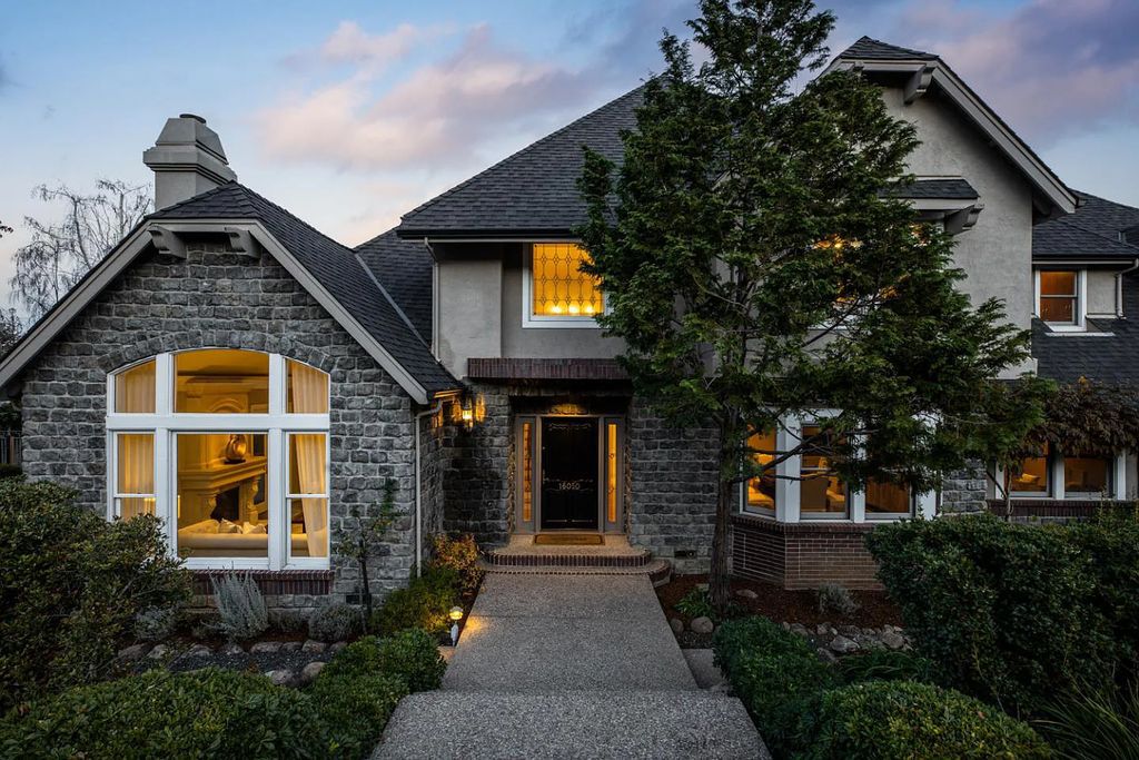 16050 Viewfield Road, Monte Sereno, California is an incredible property on 1.4 usable acres just a few short blocks to vibrant downtown Los Gatos boasting grand semi-circular staircase and vaulted ceilings, park-like back yard, 800 bottle wine cellar, and more.