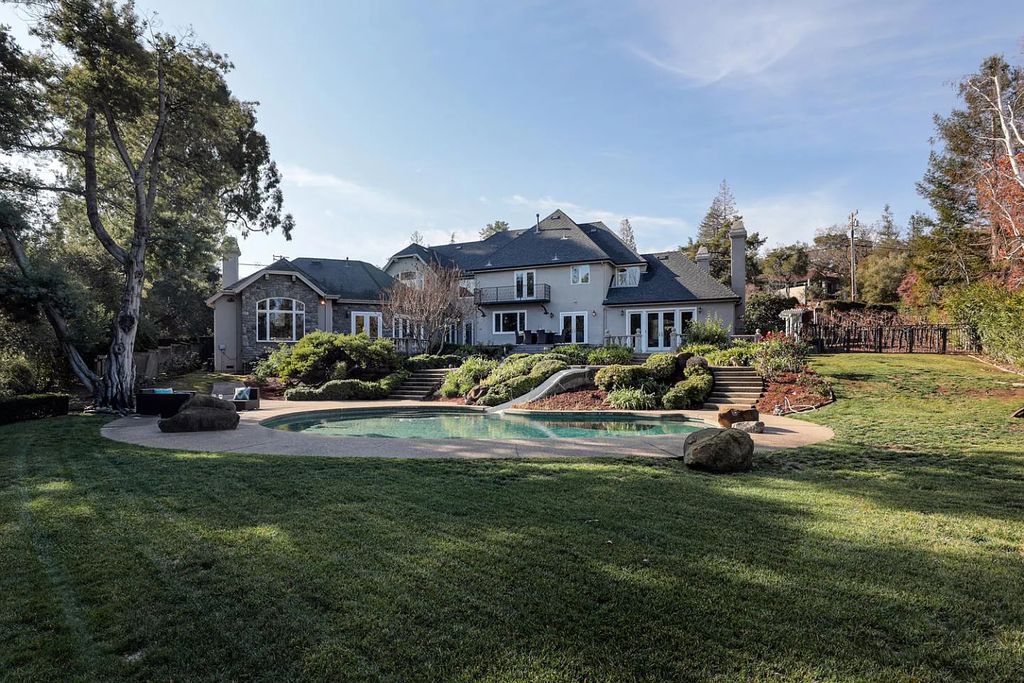 16050 Viewfield Road, Monte Sereno, California is an incredible property on 1.4 usable acres just a few short blocks to vibrant downtown Los Gatos boasting grand semi-circular staircase and vaulted ceilings, park-like back yard, 800 bottle wine cellar, and more.