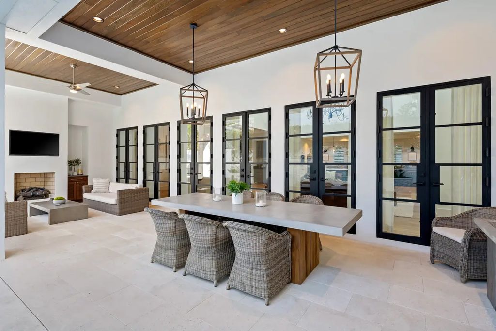 9201 Mercato Way, Naples, Florida is a magnificent gem in the heart of the Residences at Mercato just minutes from the famous Vanderbilt Beach with a custom outdoor oasis, an open floor plan, and designer touches throughout.